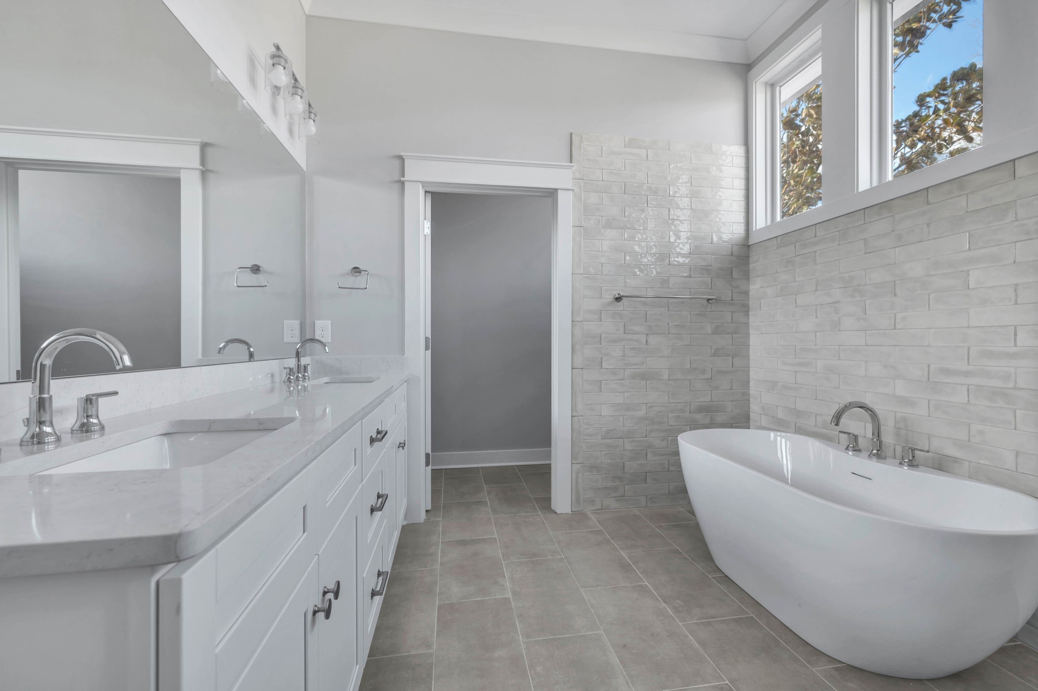 142 Strahl Street Franklin, TN 37064 - Photo 26 of 51 a spacious bathroom with double vanity two mirror and a bathtub