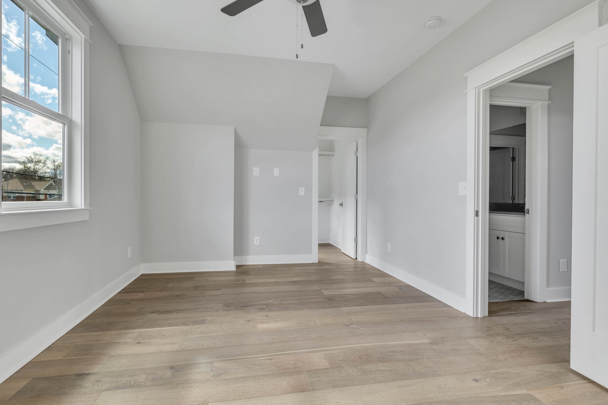 142 Strahl Street Franklin, TN 37064 - Photo 37 of 51 a view of an empty room with wooden floor and a window