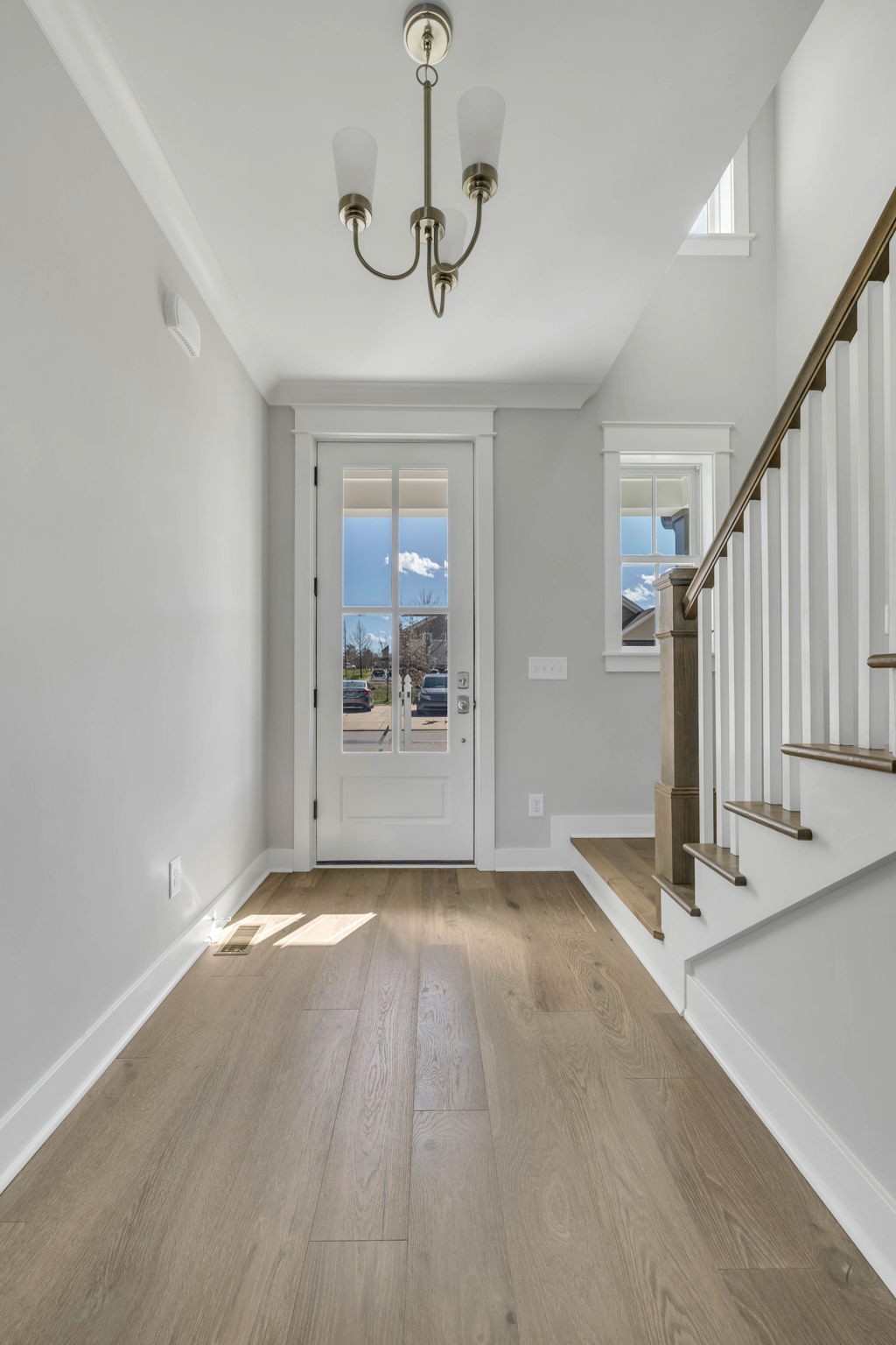 142 Strahl Street Franklin, TN 37064 - Photo 5 of 51 a view of a room with wooden floor and staircase