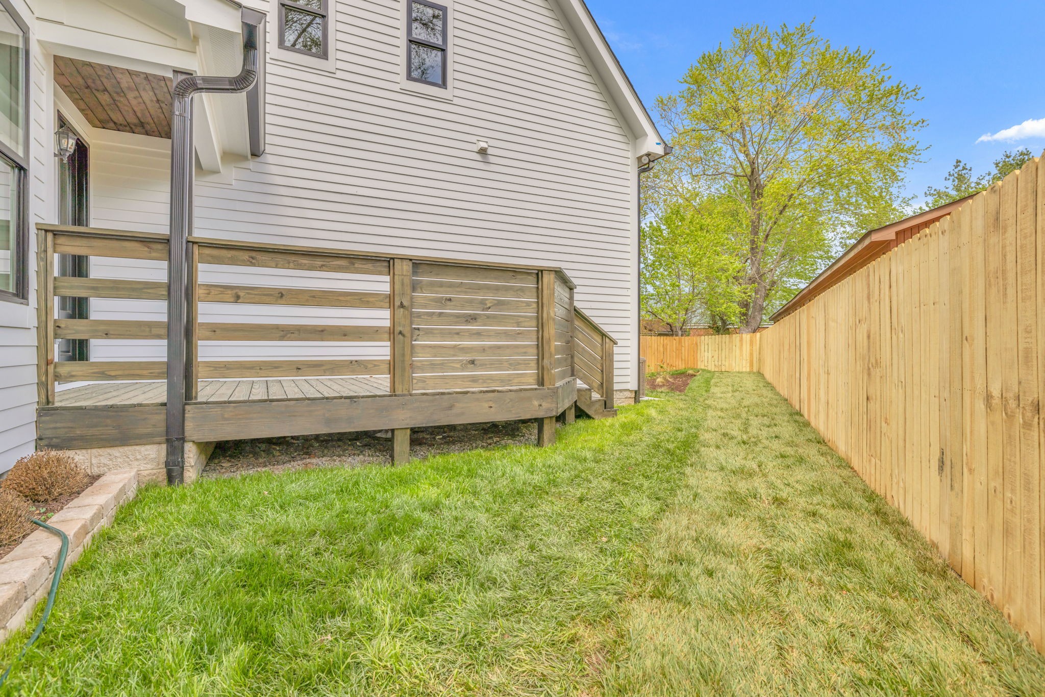 142 Strahl Street Franklin, TN 37064 - Photo 51 of 51 a view of a backyard with a garden