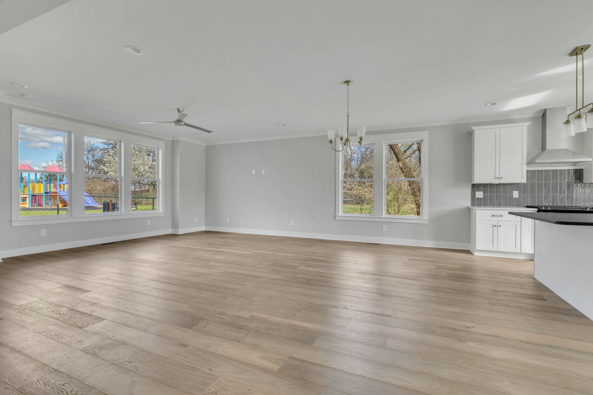 142 Strahl Street Franklin, TN 37064 - Photo 7 of 51 a view of an empty room with kitchen and window
