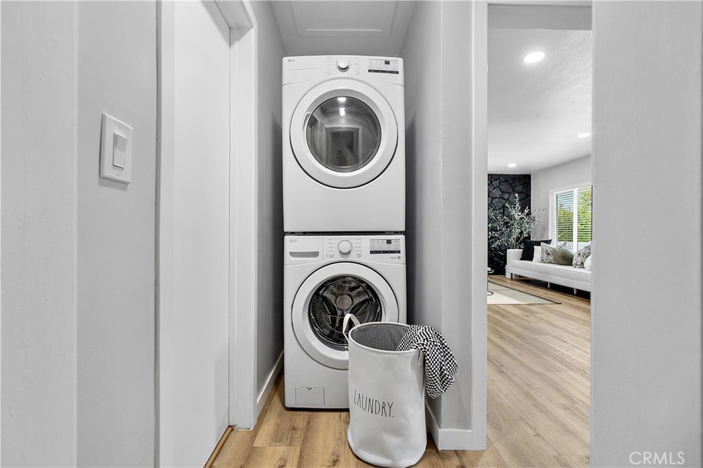 12748 Paramount Boulevard Downey, CA 90242 - Photo 32 of 72 a view of a hallway with washer and dryer