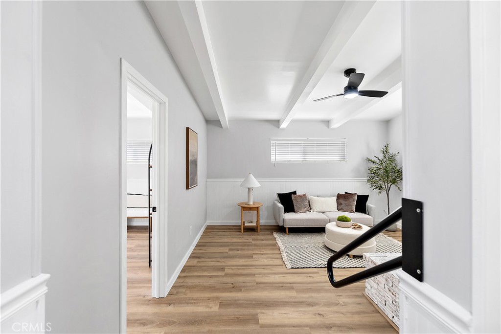 12748 Paramount Boulevard Downey, CA 90242 - Photo 42 of 72 a living room with furniture and a window