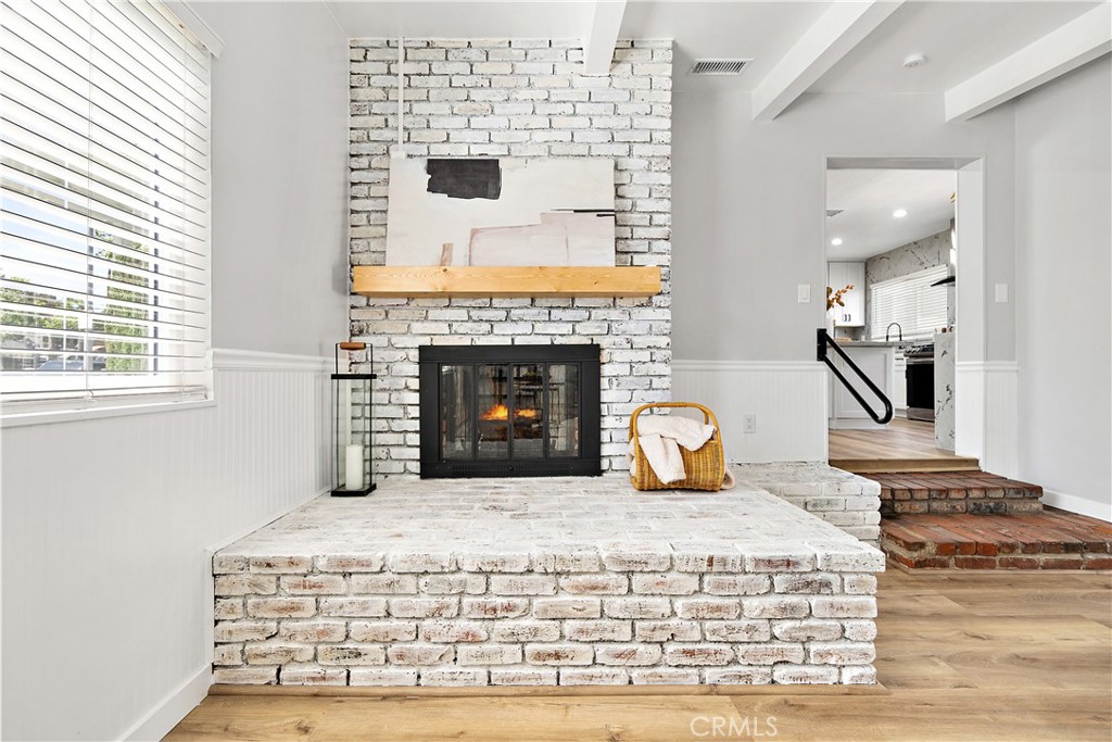 12748 Paramount Boulevard Downey, CA 90242 - Photo 44 of 72 a living room with furniture and a fireplace