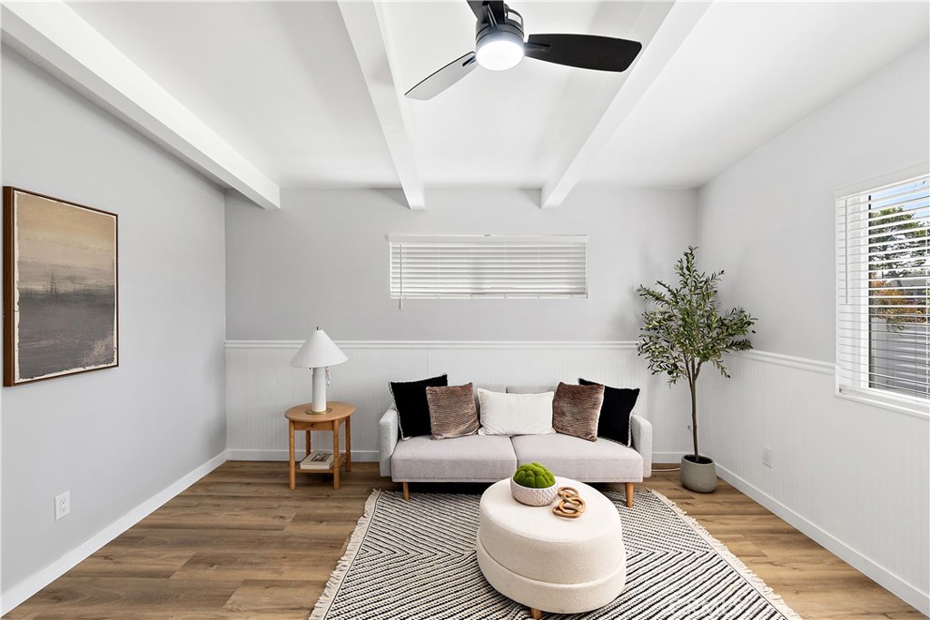 12748 Paramount Boulevard Downey, CA 90242 - Photo 45 of 72 a living room with furniture and a potted plant