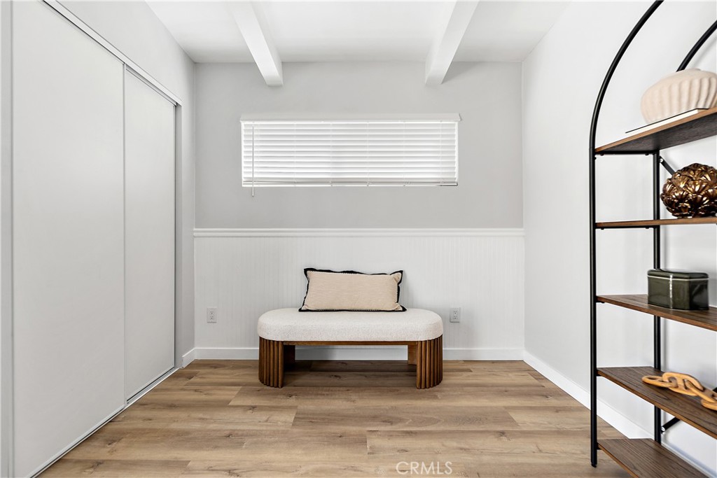 12748 Paramount Boulevard Downey, CA 90242 - Photo 47 of 72 a living room with furniture a rug and a window