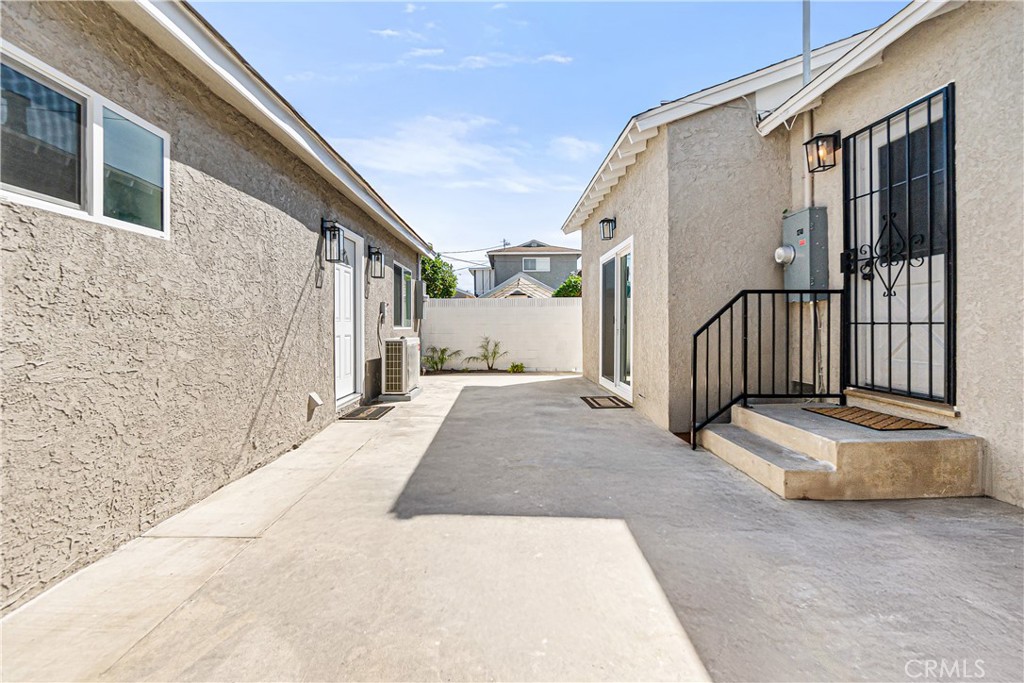 12748 Paramount Boulevard Downey, CA 90242 - Photo 50 of 72 a view of a house with a outdoor space