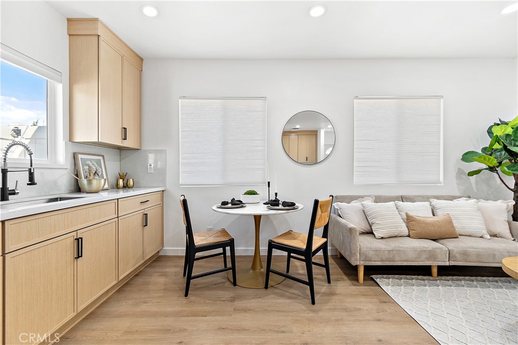 12748 Paramount Boulevard Downey, CA 90242 - Photo 54 of 72 a living room with furniture a couch and a large mirror