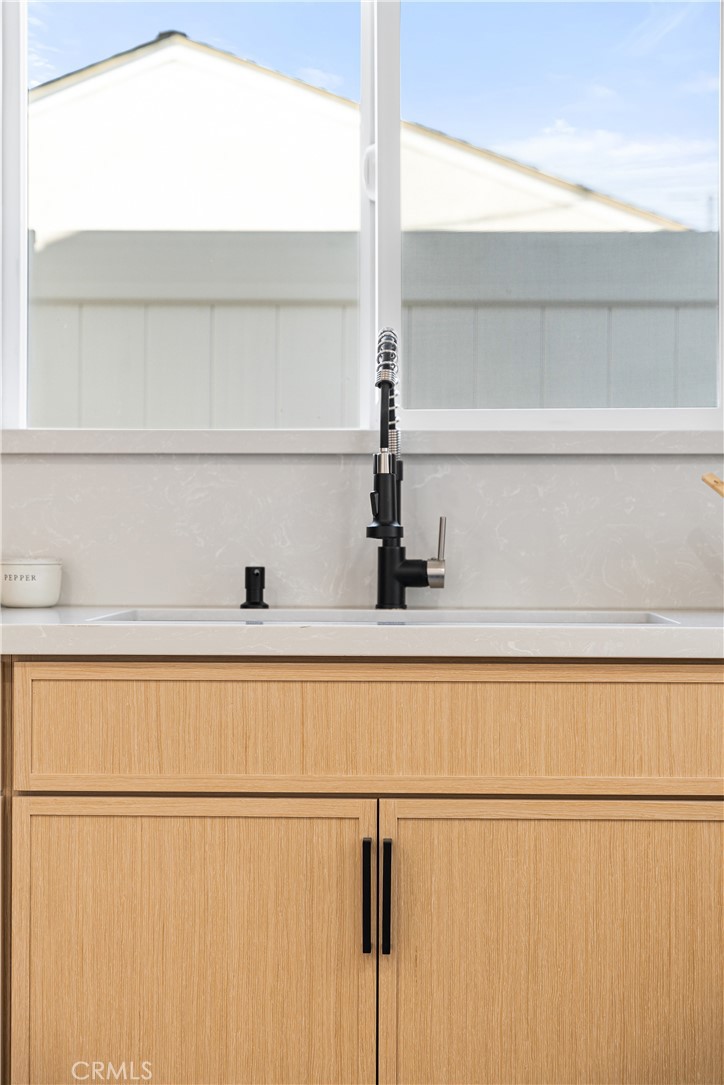 12748 Paramount Boulevard Downey, CA 90242 - Photo 68 of 72 a view of a closet with wooden floor