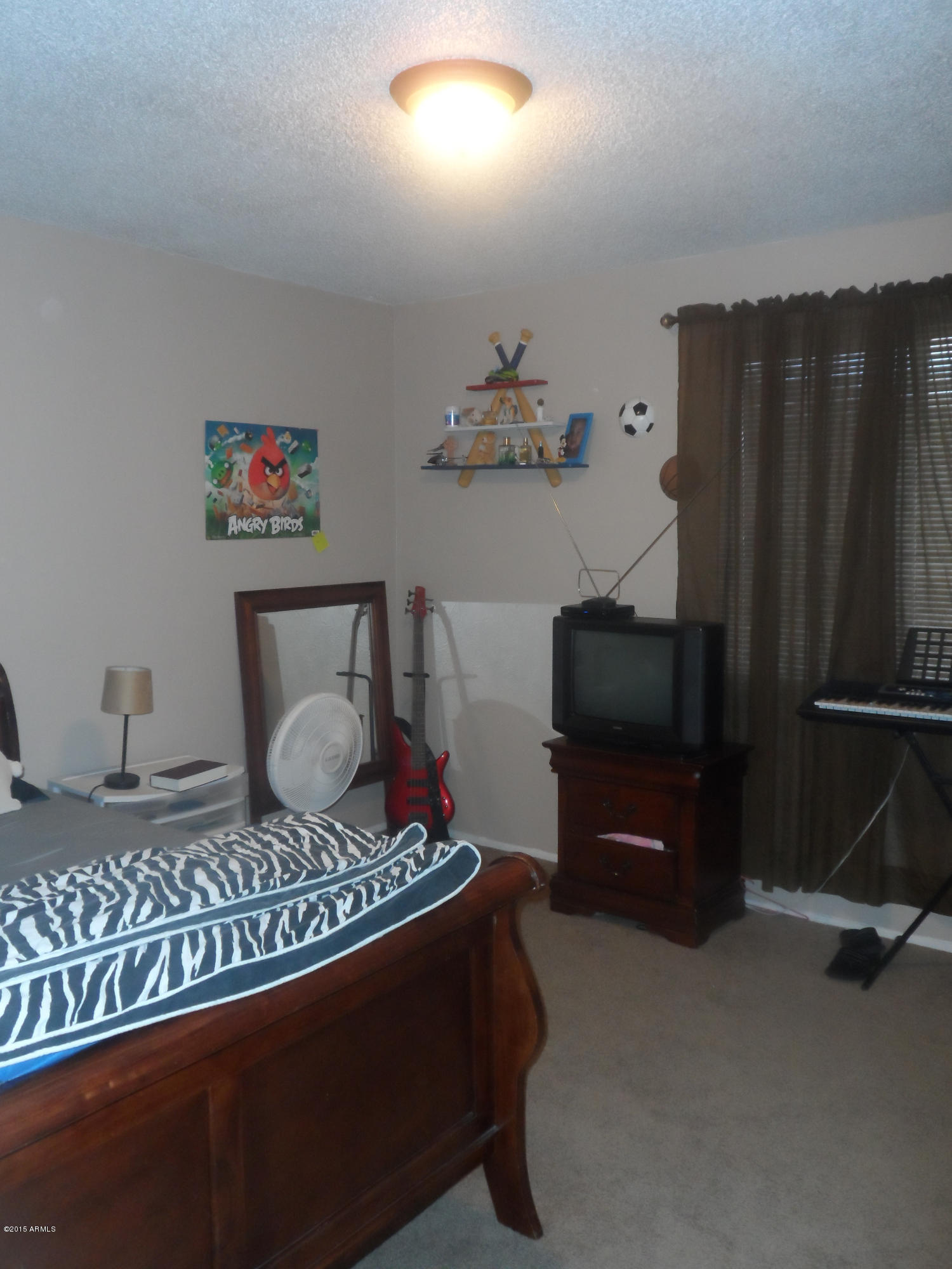 6927 West Camelback Road Phoenix, AZ 85033 - Photo 17 of 23 a living room with furniture