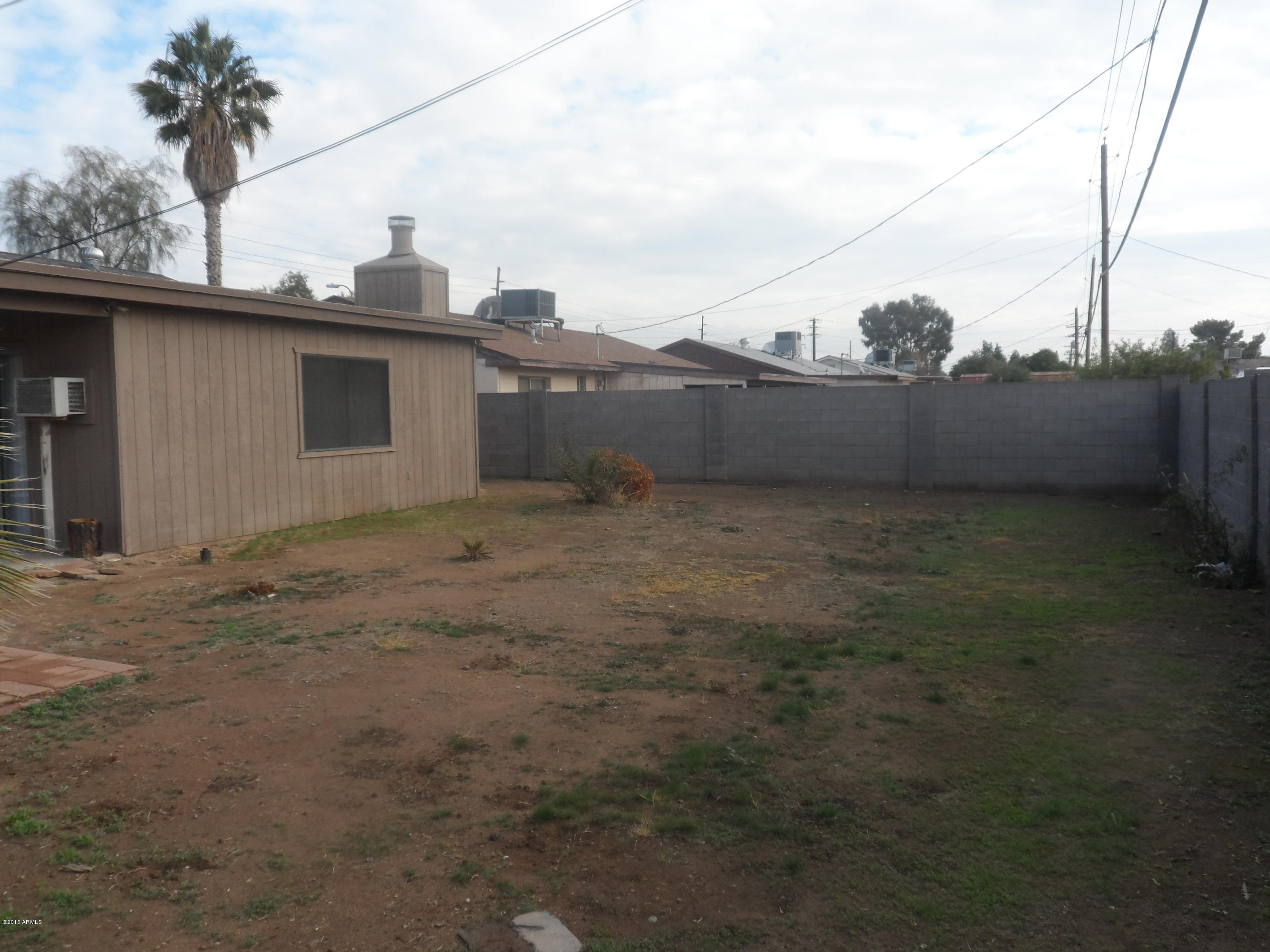 6927 West Camelback Road Phoenix, AZ 85033 - Photo 20 of 23 a view of a backyard