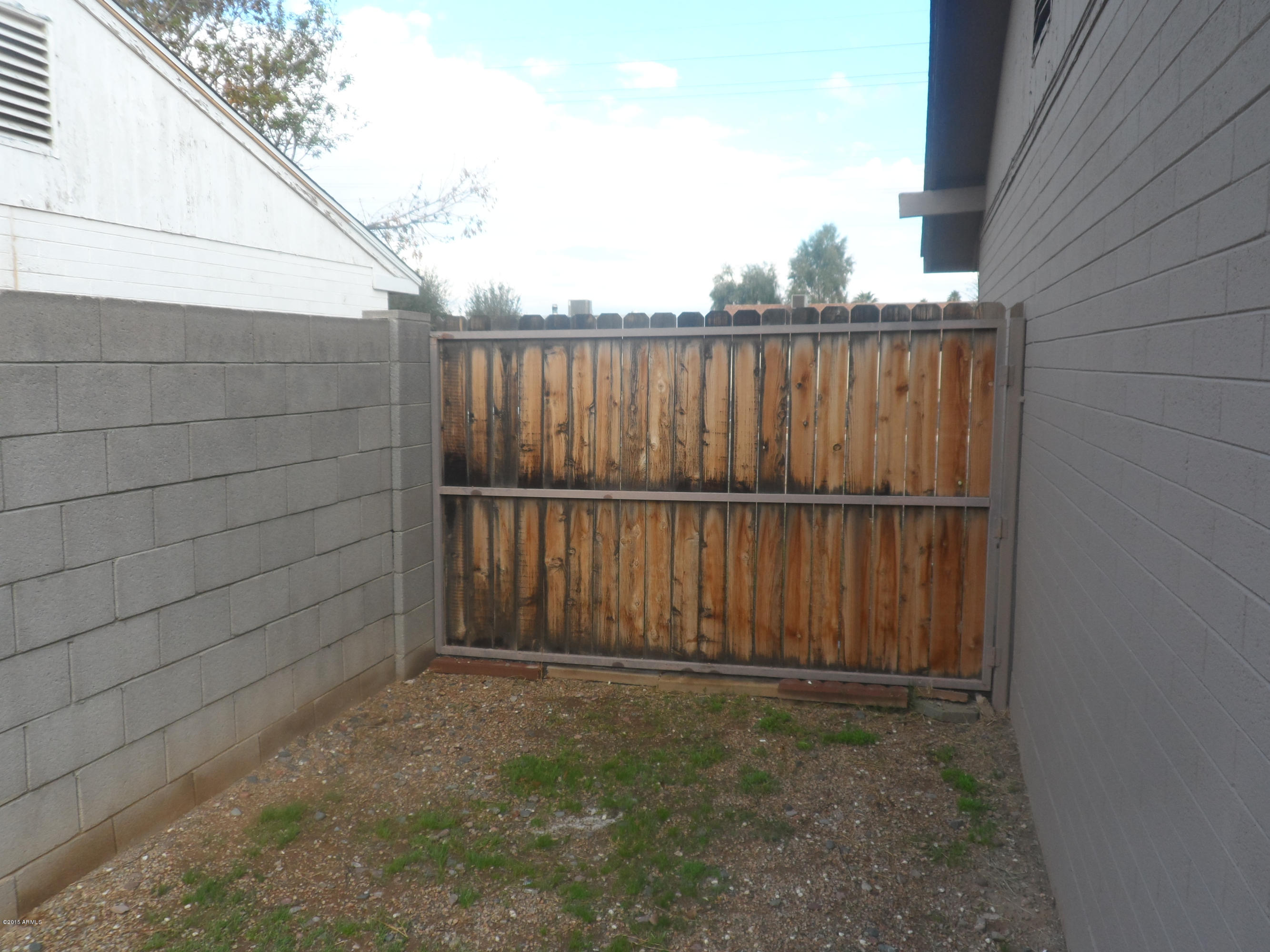 6927 West Camelback Road Phoenix, AZ 85033 - Photo 23 of 23 a view of a backyard