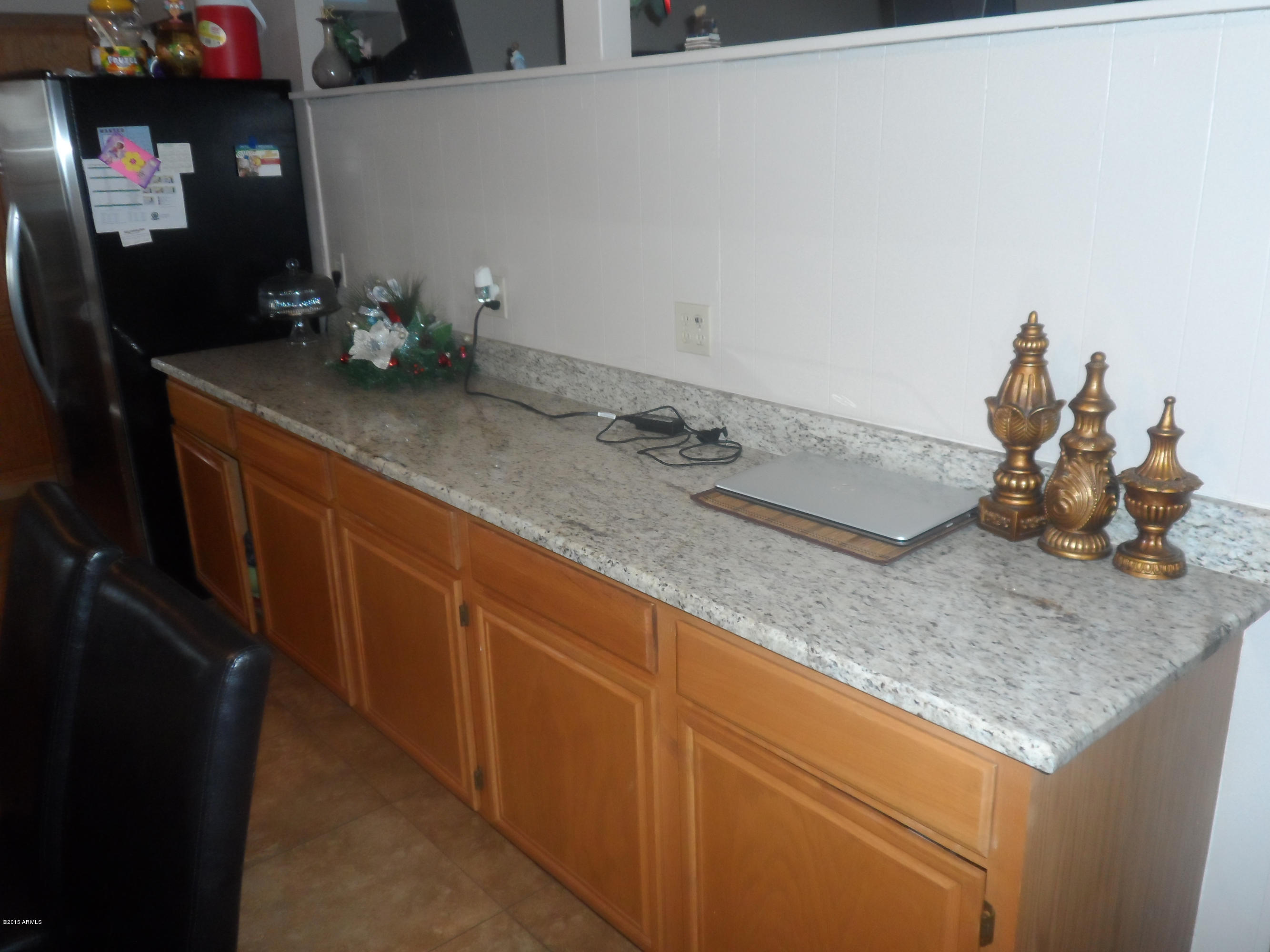 6927 West Camelback Road Phoenix, AZ 85033 - Photo 7 of 23 a bathroom with a sink and a mirror