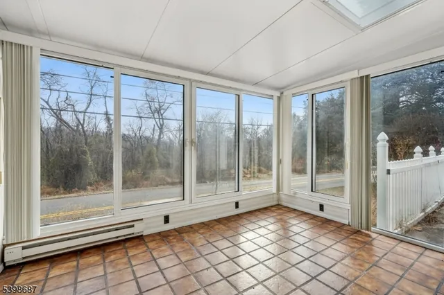a kitchen with stainless steel appliances granite countertop a stove cabinets and refrigerator