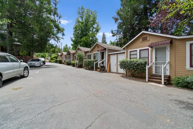 a view of a house with a street