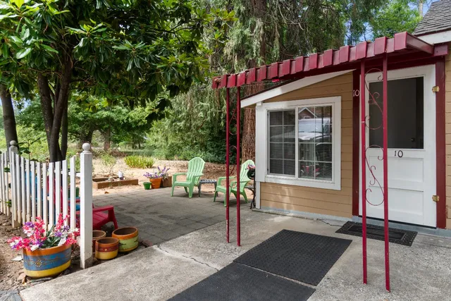 a view of a house with a sitting area