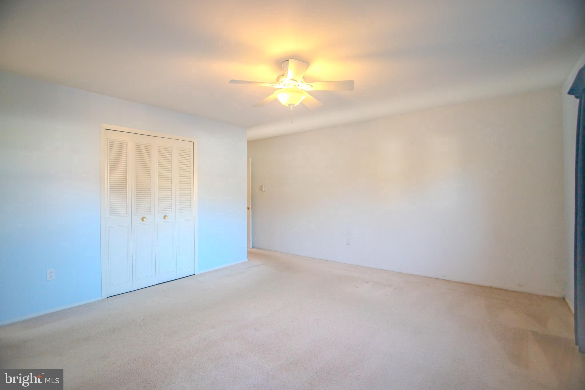 8815 Gramercy Lane Laurel, MD 20708 - Photo 22 of 42 a view of an empty room with a window