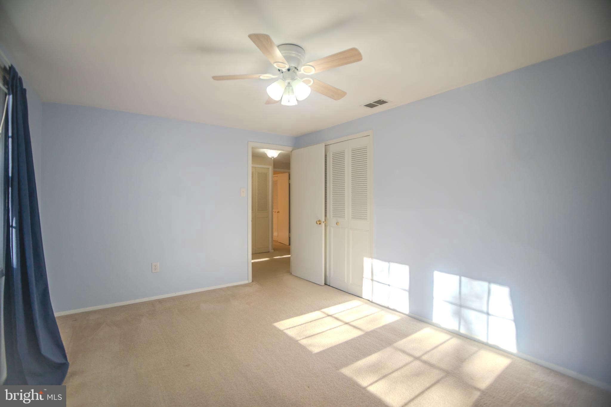 8815 Gramercy Lane Laurel, MD 20708 - Photo 28 of 42 a view of an empty room with a window