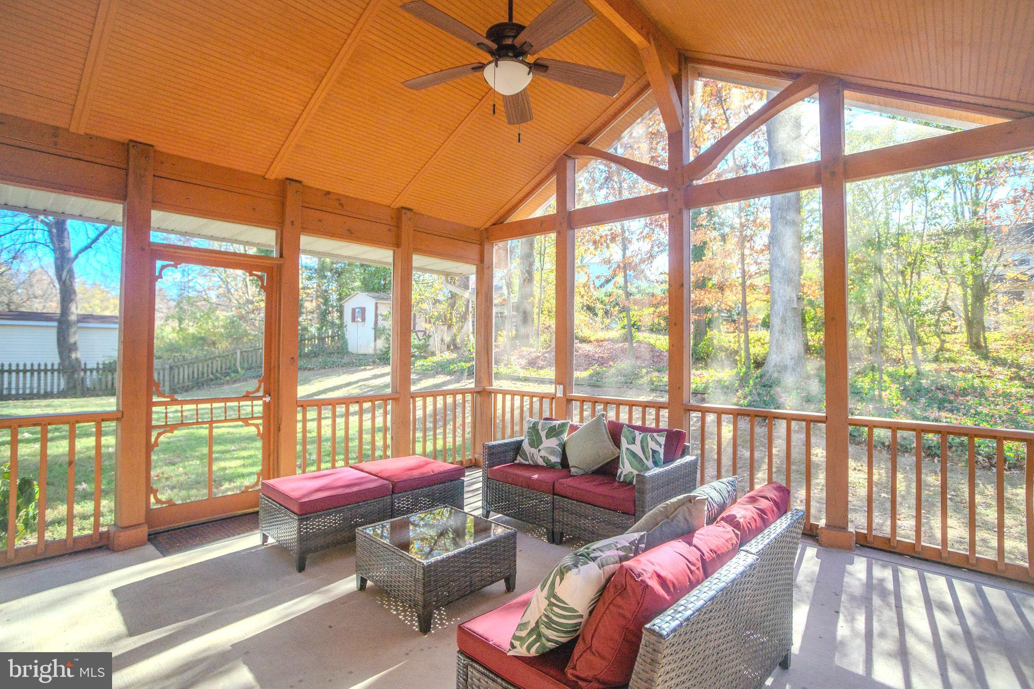 8815 Gramercy Lane Laurel, MD 20708 - Photo 33 of 42 a living room with furniture and a floor to ceiling window