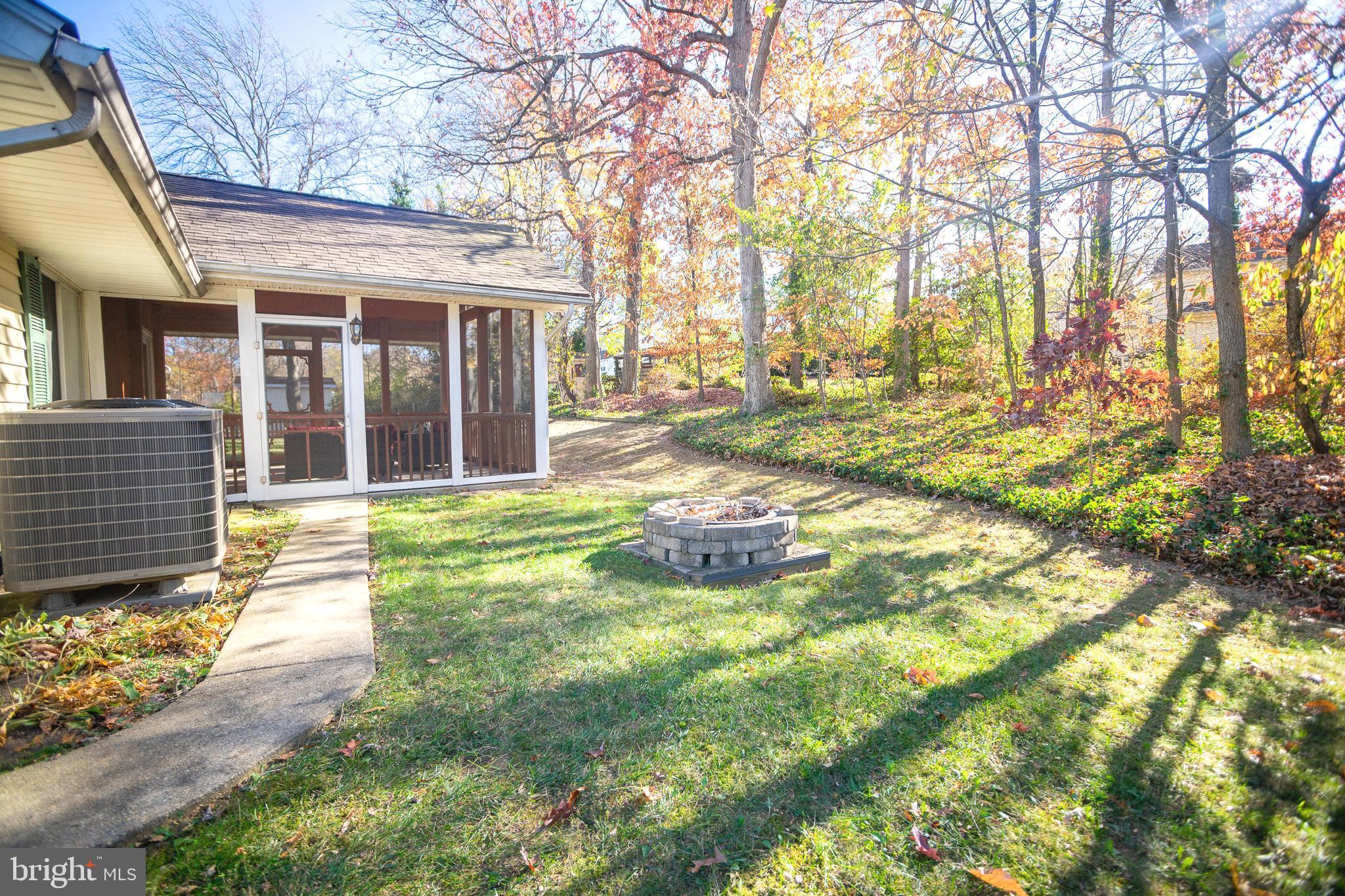 8815 Gramercy Lane Laurel, MD 20708 - Photo 36 of 42 a view of a house with backyard and sitting area