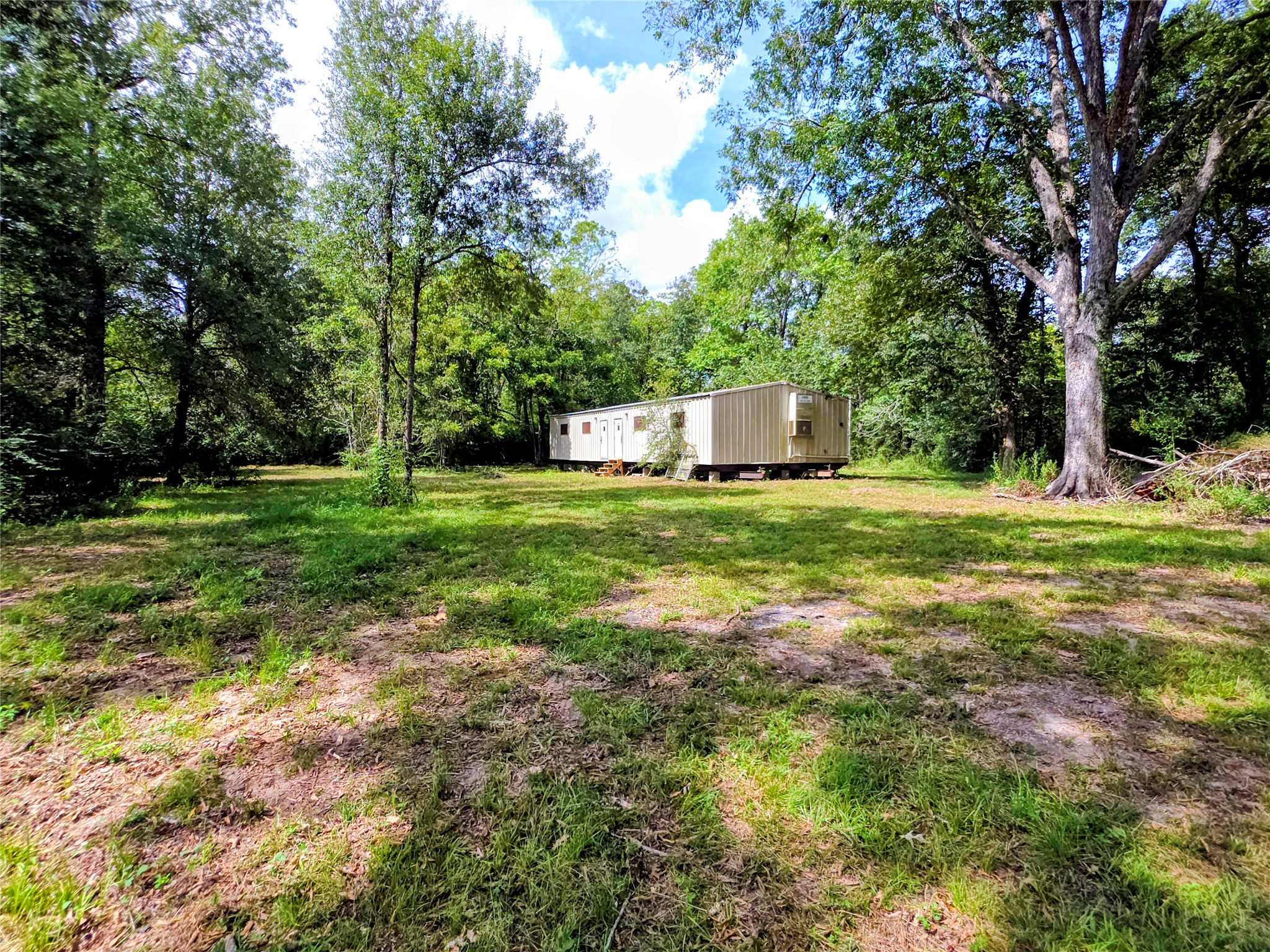 0 3rd Street Batson, TX 77519 - Photo 2 of 7 Large shaded 1+/- acre lot with building.