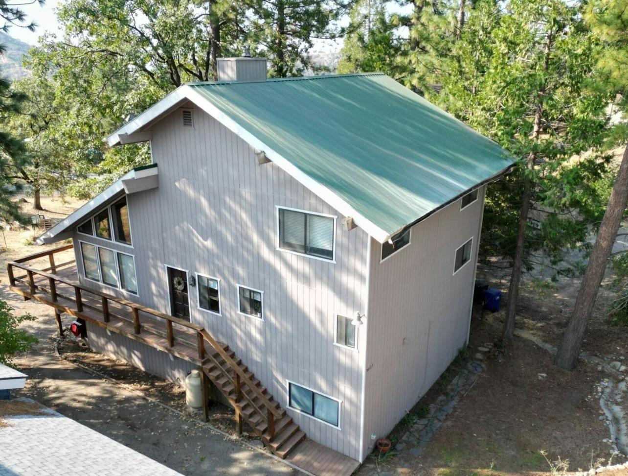 34125 Shaver Springs Road Auberry, CA 93602 - Photo 1 of 9 a house view with a backyard space