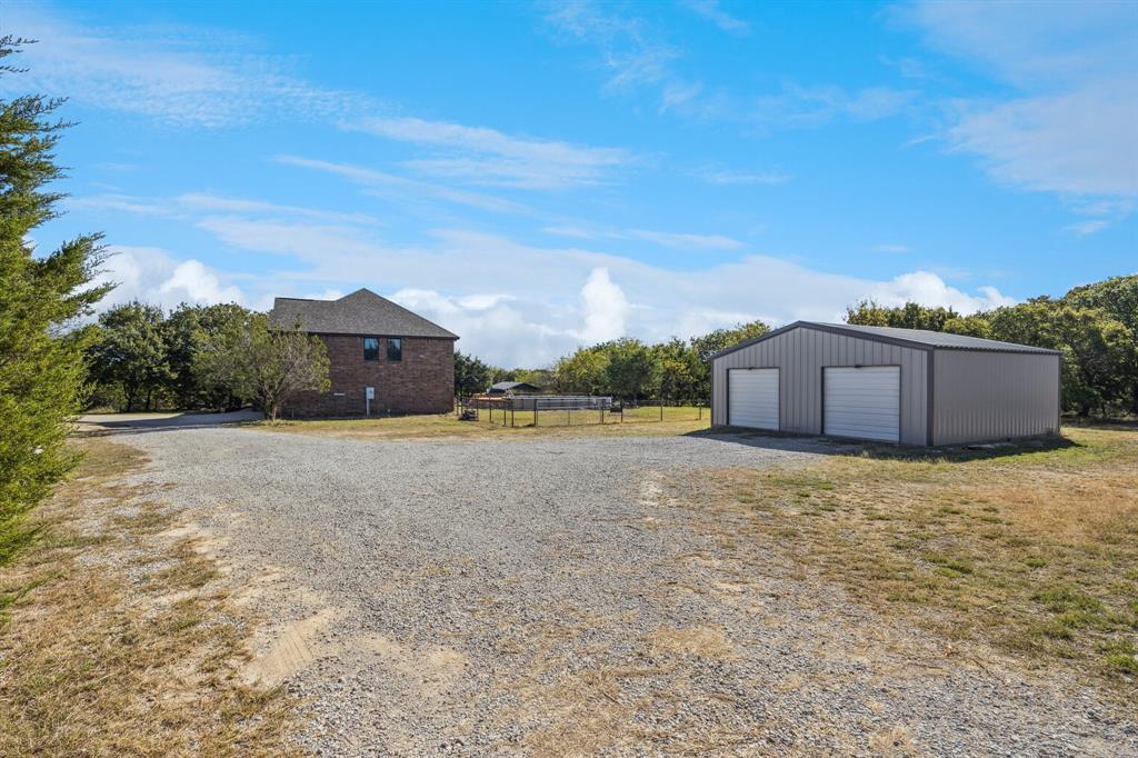 3390 Zion Hill Road Weatherford, TX 76088 - Photo 3 of 40 a house view with a outdoor space