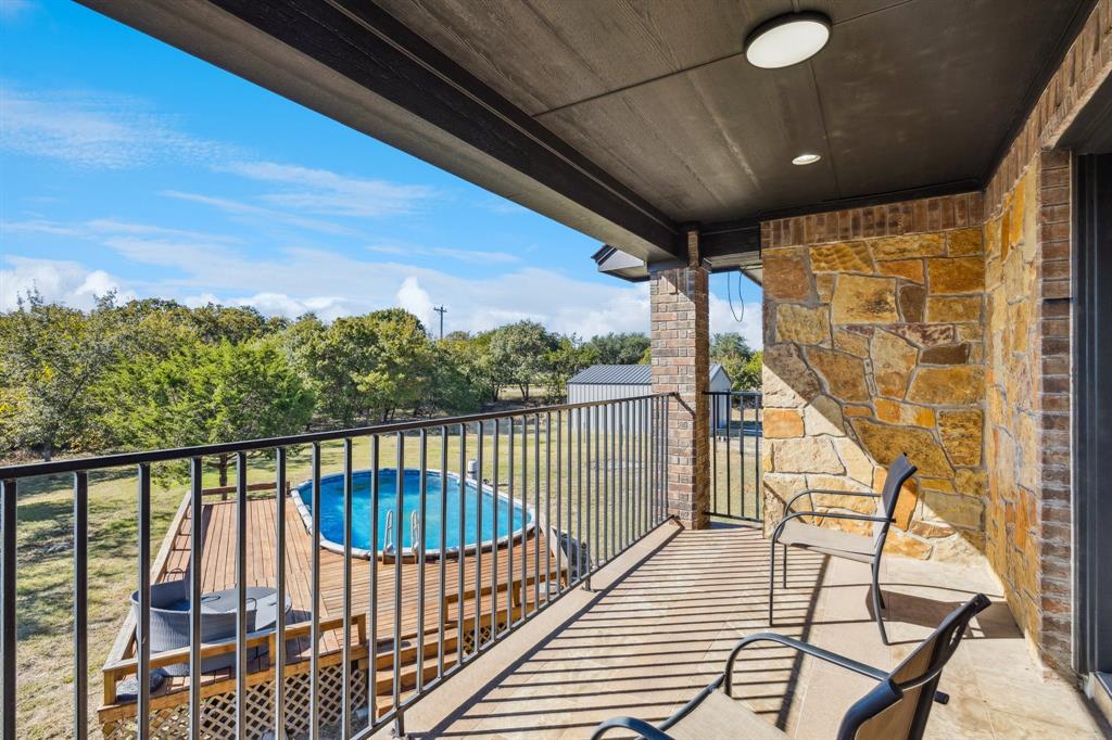 3390 Zion Hill Road Weatherford, TX 76088 - Photo 34 of 40 a view of balcony with furniture