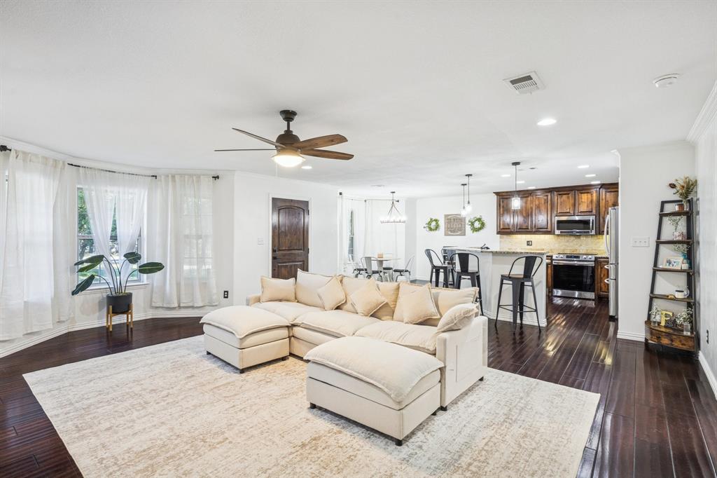 3390 Zion Hill Road Weatherford, TX 76088 - Photo 5 of 40 a living room with furniture and wooden floor