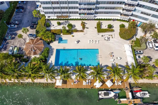 aerial view of a house with a swimming pool