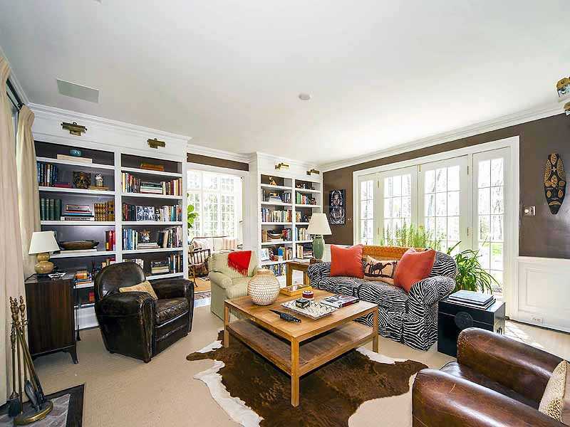 4 Point O Woods Road Darien, CT 06820 - Photo 10 of 23 a living room with furniture and a large window