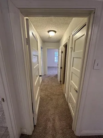 an empty room with a bench