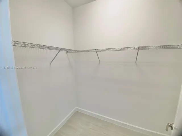 a view of small space with racks on the wall