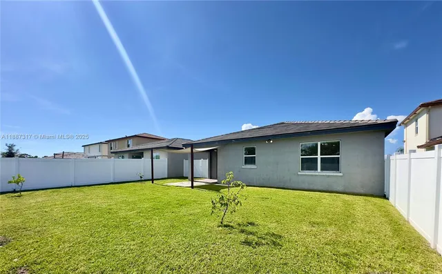 a house view with a garden space