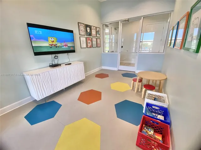 a bed room with a bed mirror and a window