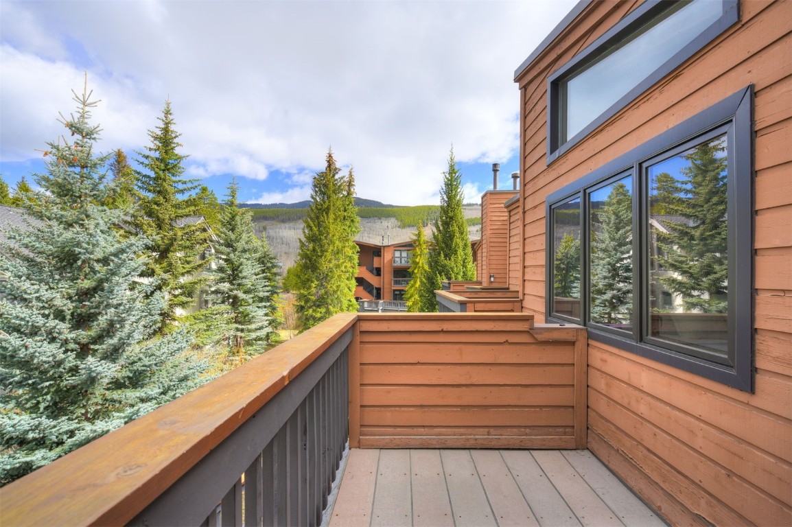 1473 East Keystone Road, Unit 2933 Keystone, CO 80435 - Photo 11 of 18 a view of balcony with wooden floor and fence