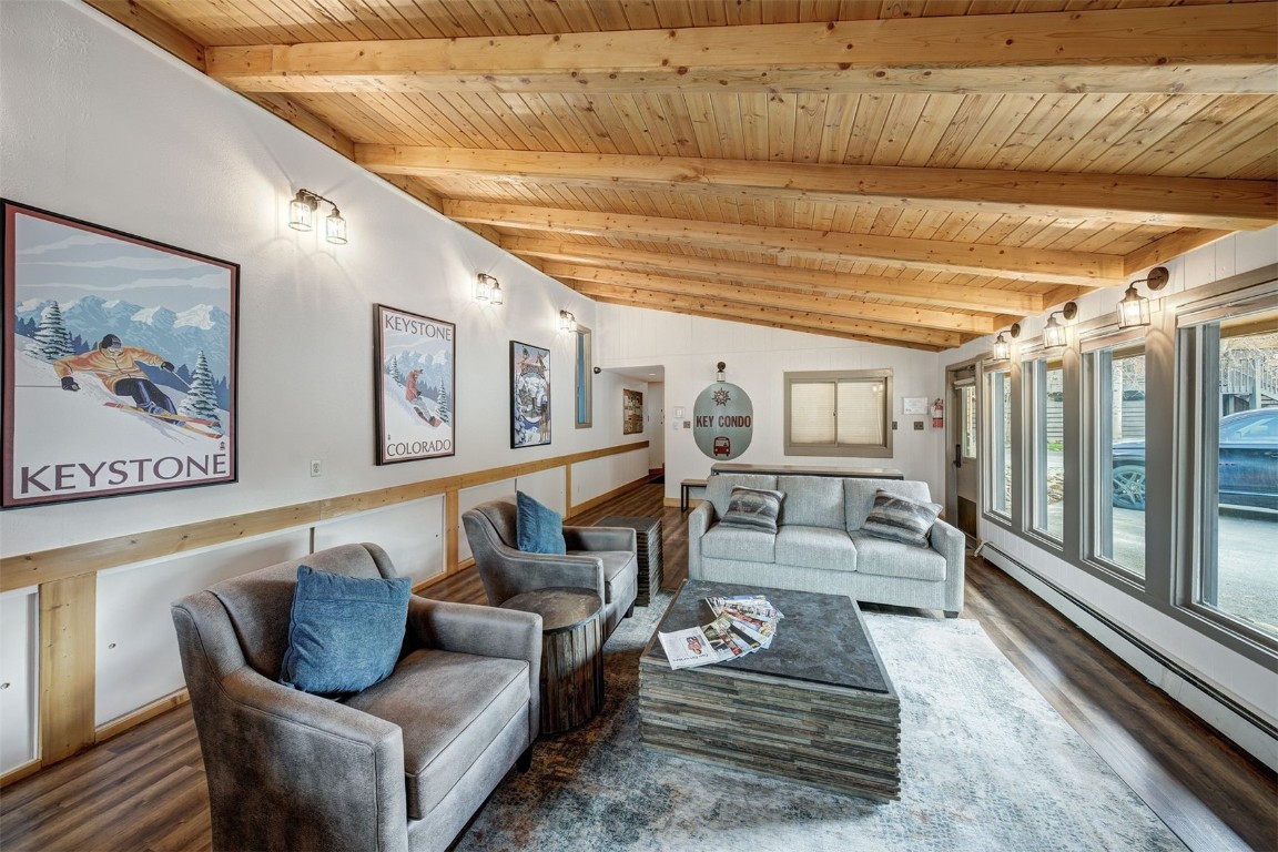 1473 East Keystone Road, Unit 2933 Keystone, CO 80435 - Photo 14 of 18 a living room with furniture and wooden floor