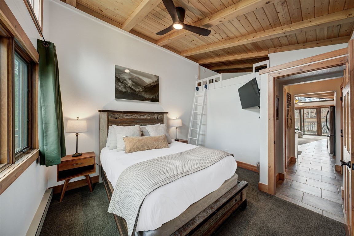 1473 East Keystone Road, Unit 2933 Keystone, CO 80435 - Photo 6 of 18 a bedroom with a bed and a mirror