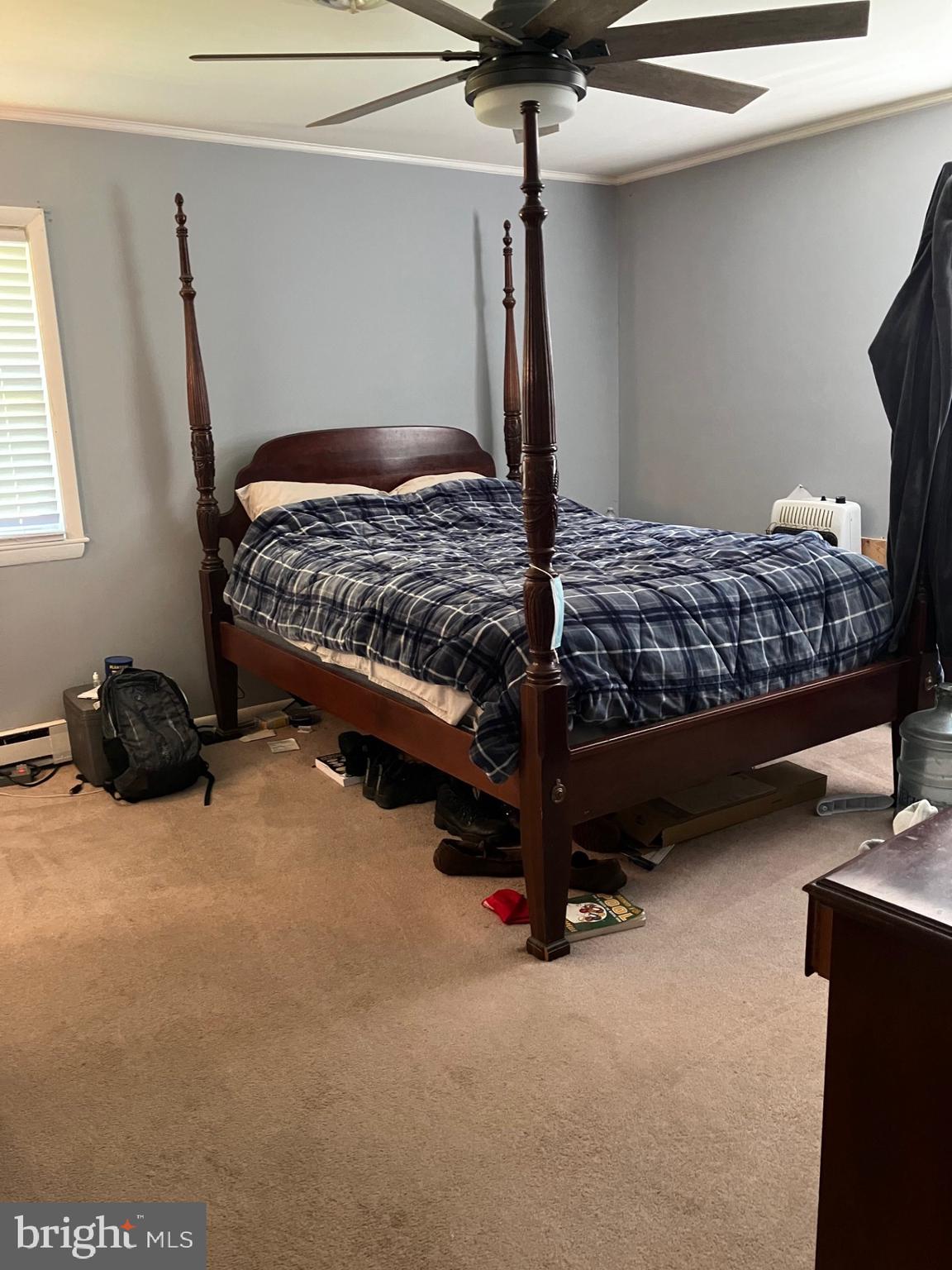 209 Olive Branch Road Stevensville, MD 21666 - Photo 17 of 19 a bedroom with a bed and a window