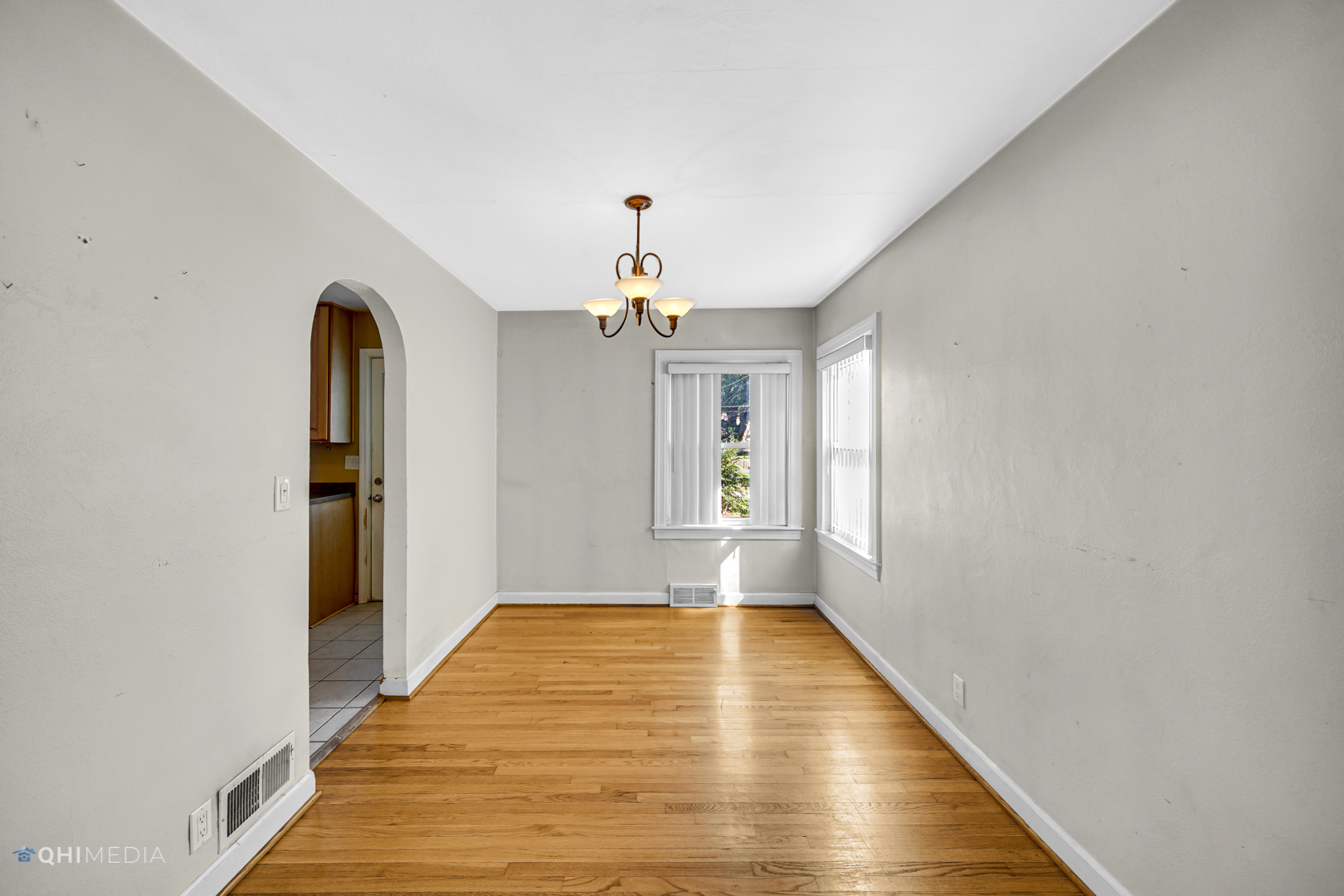 3438 Randolph Street Lansing, IL 60438 - Photo 11 of 23 a view of a room with wooden floor closet and windows
