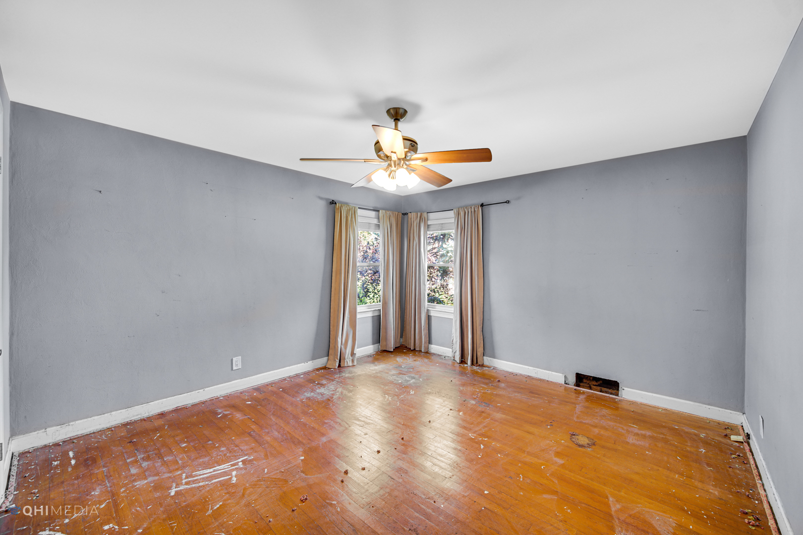 3438 Randolph Street Lansing, IL 60438 - Photo 16 of 23 a view of a room with a ceiling fan and window
