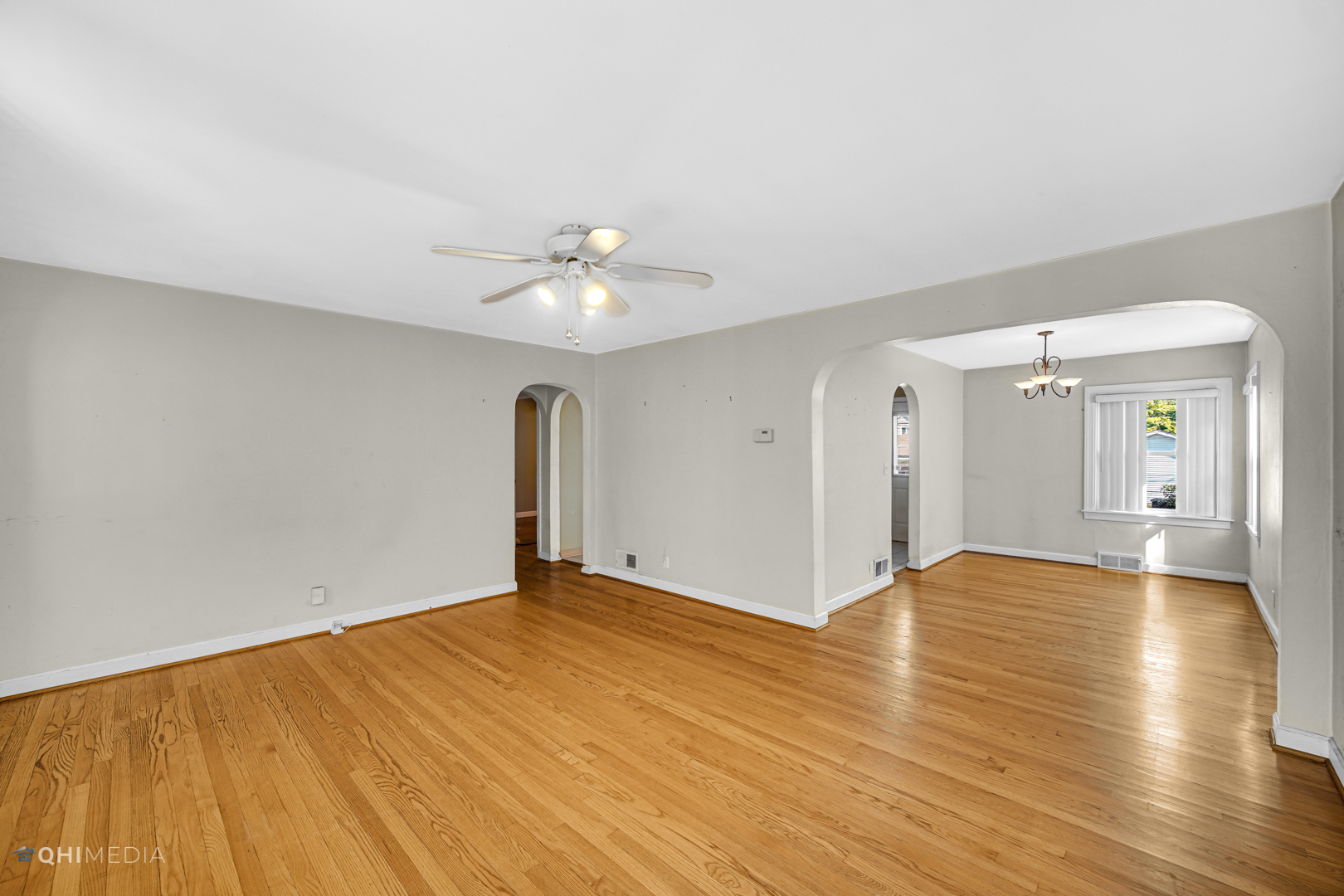3438 Randolph Street Lansing, IL 60438 - Photo 10 of 23 a view of an empty room with wooden floor