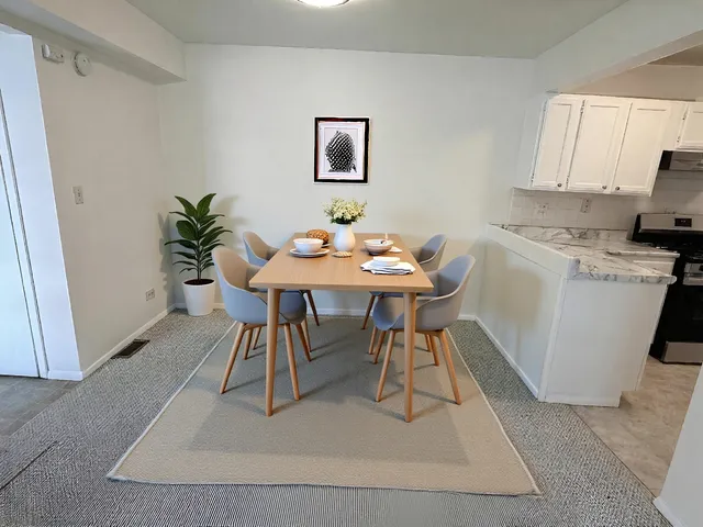 a workspace with furniture and window