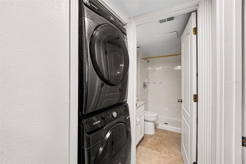 5567 Sea Forest Drive, Unit 324 New Port Richey, FL 34652 - Photo 11 of 23 a view of bathroom with washer and dryer