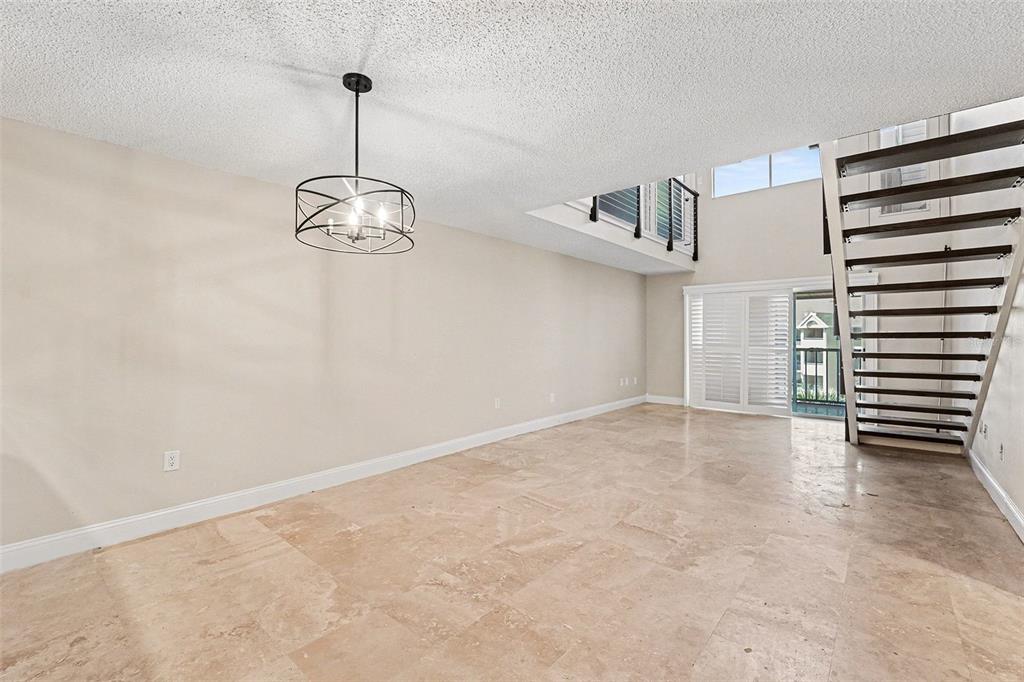 5567 Sea Forest Drive, Unit 324 New Port Richey, FL 34652 - Photo 7 of 23 a view of a room with gym equipment