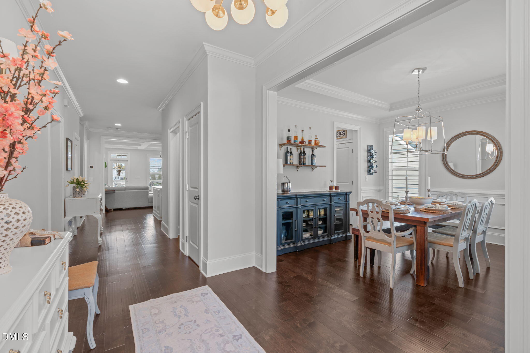 4144 Olde Judd Drive Willow Spring, NC 27592 - Photo 5 of 52 a view of a dining room and livingroom with furniture wooden floor a chandelier
