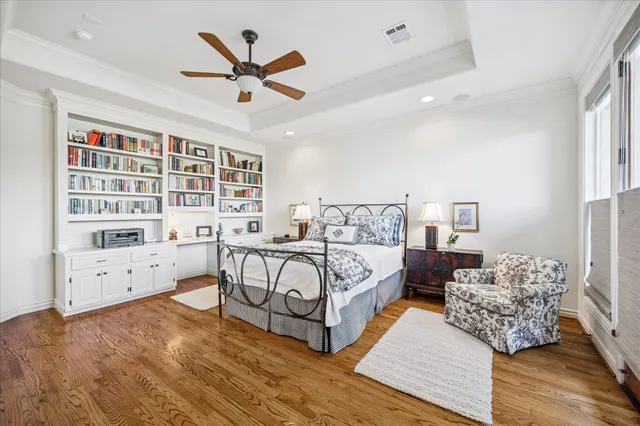 a bed room with bed and windows