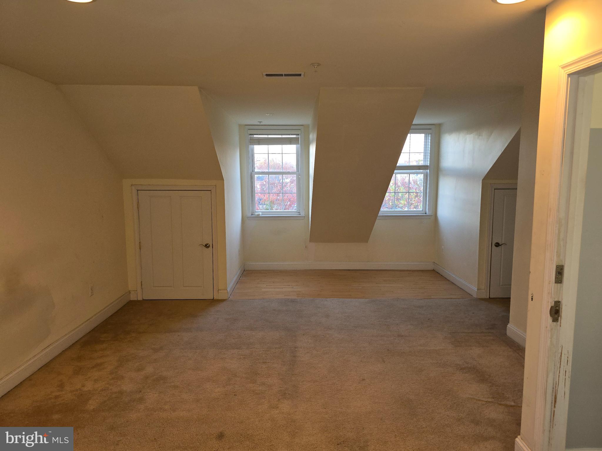 829 McHenry Street Baltimore, MD 21230 - Photo 12 of 17 an empty room with windows