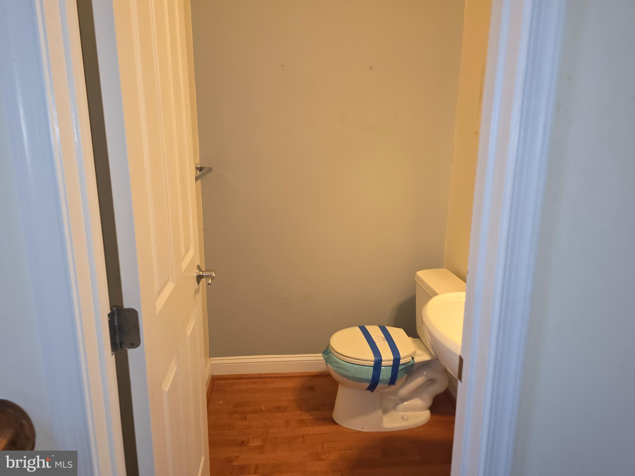 829 McHenry Street Baltimore, MD 21230 - Photo 7 of 17 a bathroom with a sink and toilet