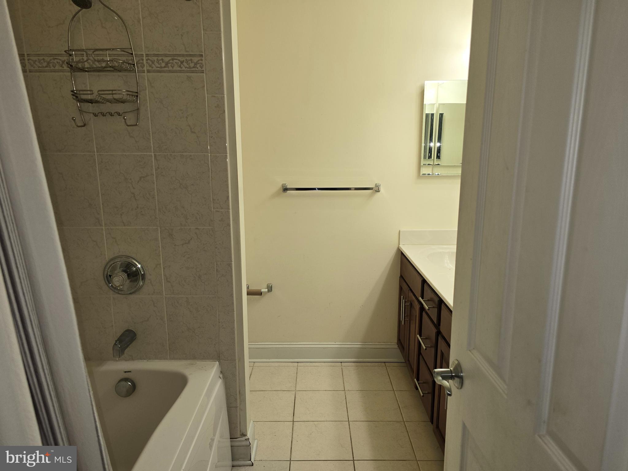 829 McHenry Street Baltimore, MD 21230 - Photo 9 of 17 a bathroom with a bathtub and a shower